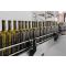 Wine bottles on production line to be filled.